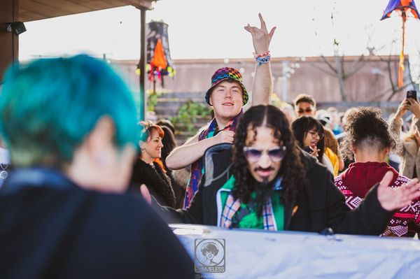 Crowd cheering in front of the DJ booth at The Breakfast Club 2024